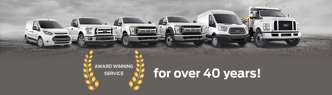 Lineup of Ford vehicles showcasing award-winning service for over 40 years, featuring various models including vans and trucks on a textured background.