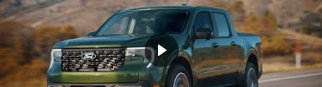 2025 Ford Maverick in green color parked on a scenic road with mountains in the background, showcasing its modern design and versatility.