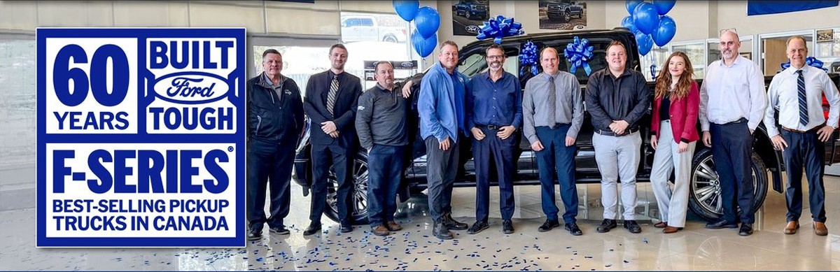 The Stockfish Ford team in the North Bay showroom, with the Ford F-Series 60 Years Built Ford Tough badge